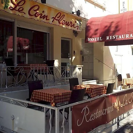 فندق Le Coin Fleuri